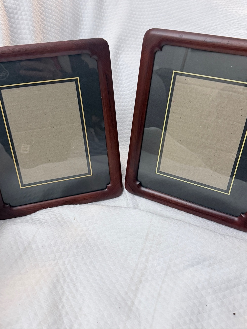 Pair of Dark Mahogany Photo Frames with Black & Gold Mats.